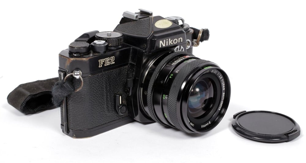 Image of Nikon FE2 35mm SLR Film Camera with Wide angle Sigma MC 28mm F2.8 lens #8051