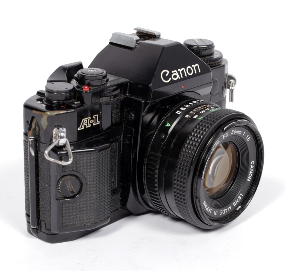 Image of Canon A-1 35mm SLR Film Camera with 50mm F1.8 FDn lens #553