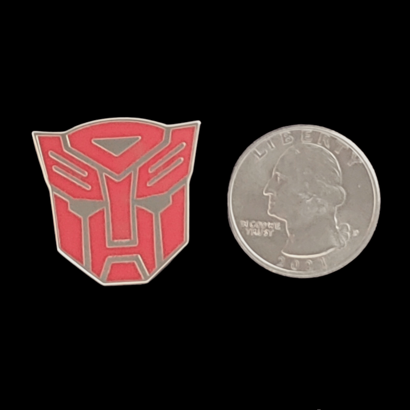 TRANSFORMERS ENAMEL PIN