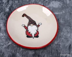 Image of Gnome in red buffalo plaid on small ceramic dish, hand painted