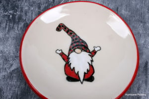 Image of Gnome in red buffalo plaid on small ceramic dish, hand painted
