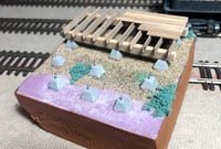 Image 2 of 12 concrete footing blocks with re-bar pins, HO scale or larger