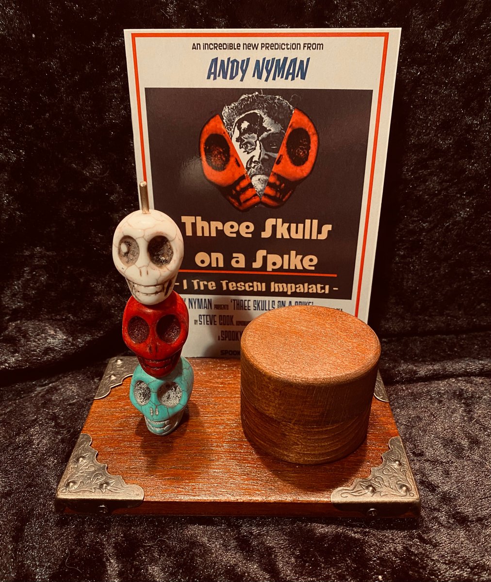 3 skulls on a spike