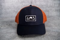 Image 1 of 603 - Navy/Orange Trucker Hat - low crown / structured hat 