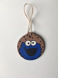 Image 1 of Cookie Monster inspired hand painted wooden ornament.