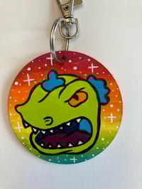 Image 3 of Rugrats Reptar hand painted wooden keychain