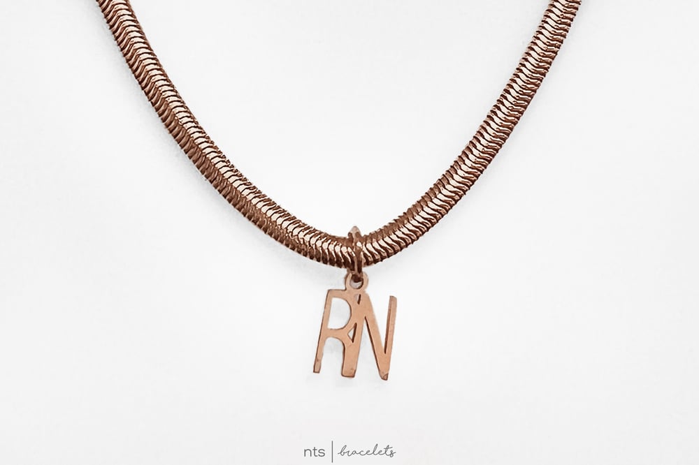 Image of AVERY WOODS x NTS COLLAB NECKLACE (Limited Edition + Rose Gold Snake Chain)