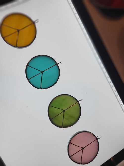 Image of M. peace sign - stained glass