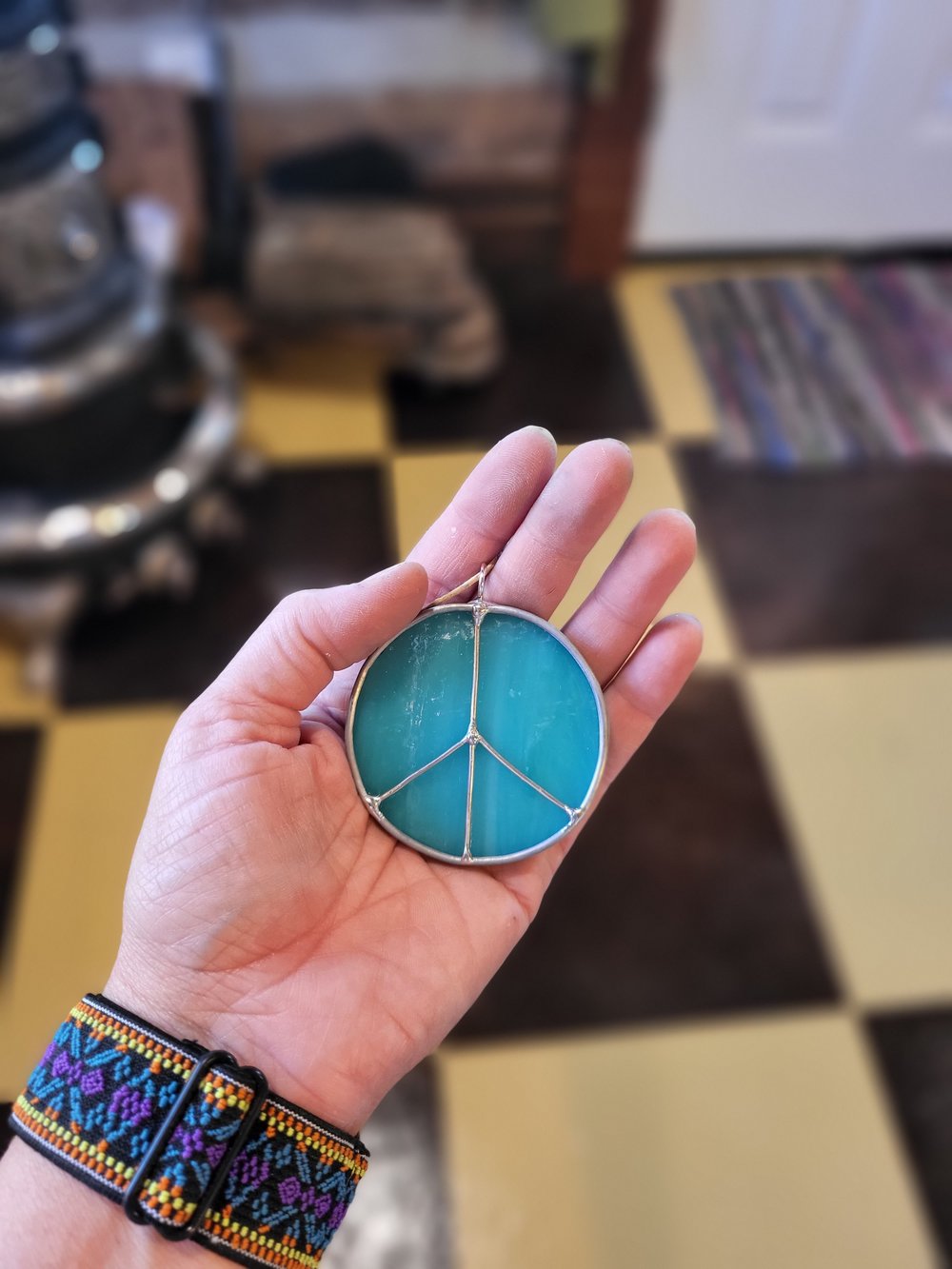 Image of M. peace sign - stained glass