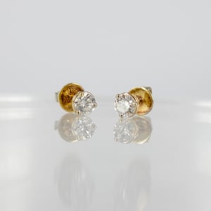 Image of 18ct yellow gold diamond stud earrings. 2 = .50pt FSI2 total weight. Pj5978