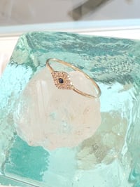 Image 2 of 14k solid gold diamond & sapphire petite evil eye ring