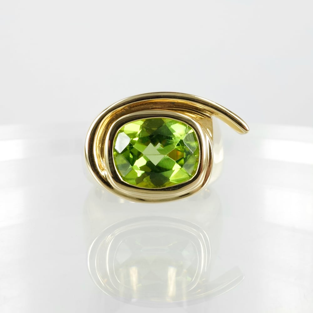 Image of Large 9ct yellow gold cocktail ring set with 3.74ct peridot. Pj5970