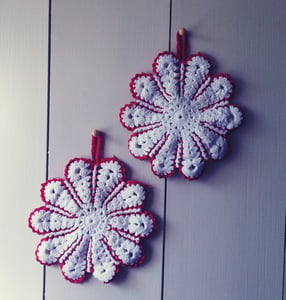 Image of hand knitted pot holders