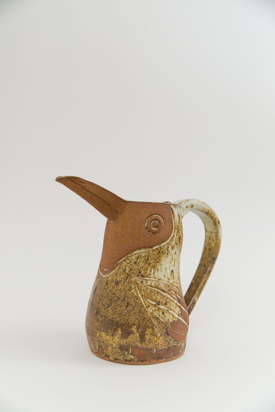 Image of Large Matte Yellow Iron Speckled Toucan Family Pitcher