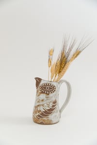 Image 1 of Medium Brown Eyed Glossy White Flying Bird Pitcher