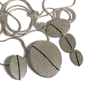 Image of Triple Drop Sewn Up necklace
