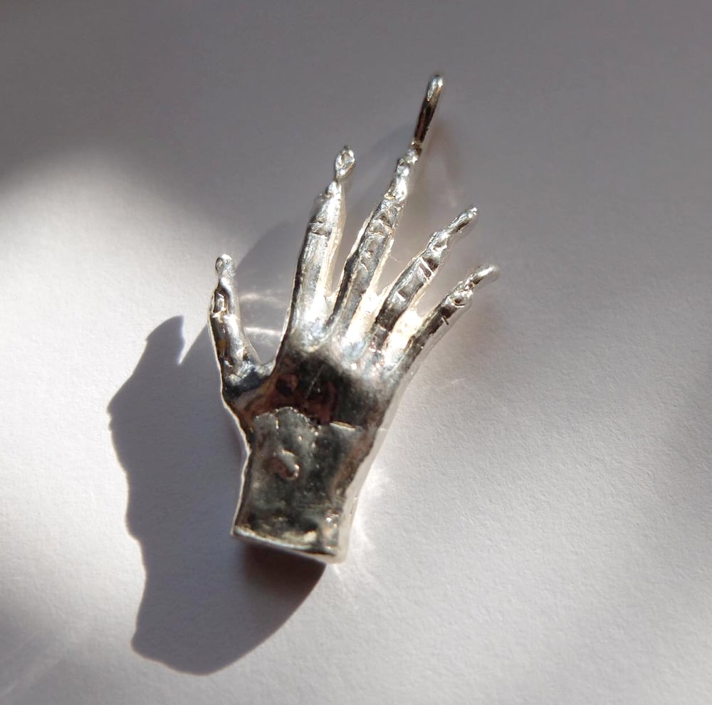 Hand of Glory charm (silver/bronze)