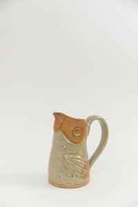 Image 1 of Medium Light Green Toasty Face Handled Bird Pitcher