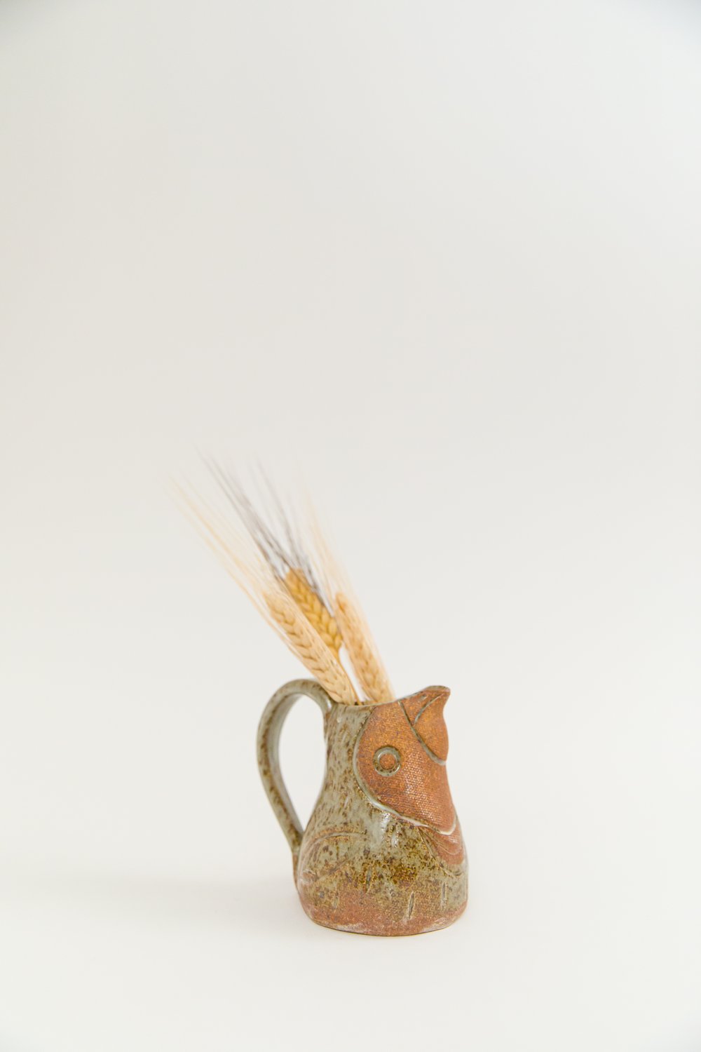 Image of Toasty Face Olive Baby Bird Creamer with Handle