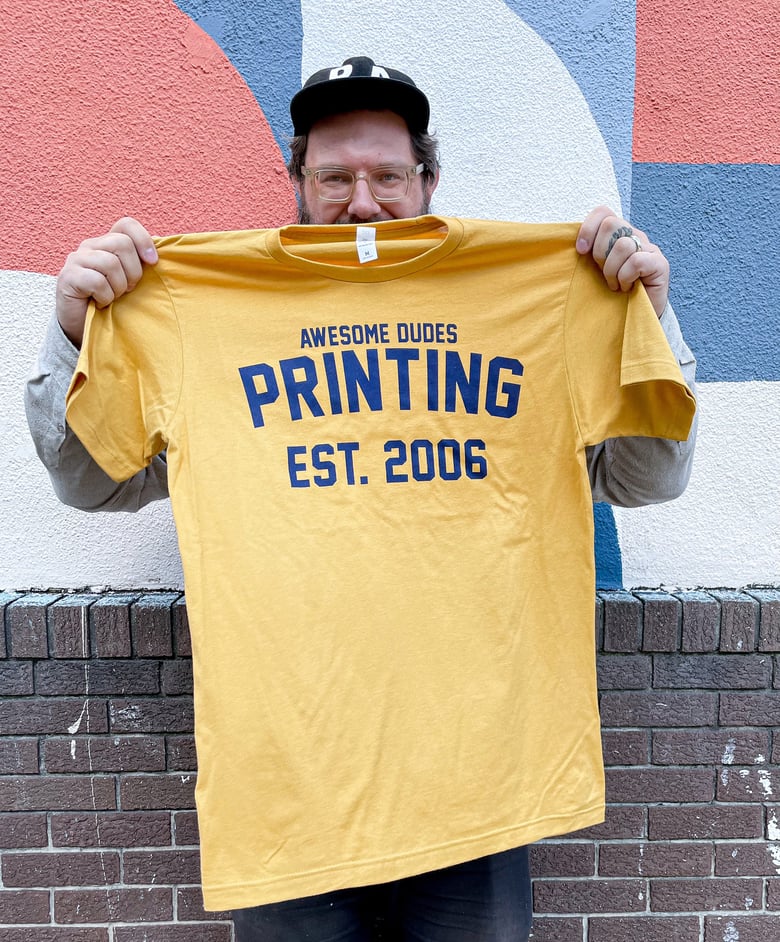 Image of Gold Varsity Printing - t-shirt