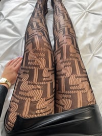 Image 1 of F fishnet tights