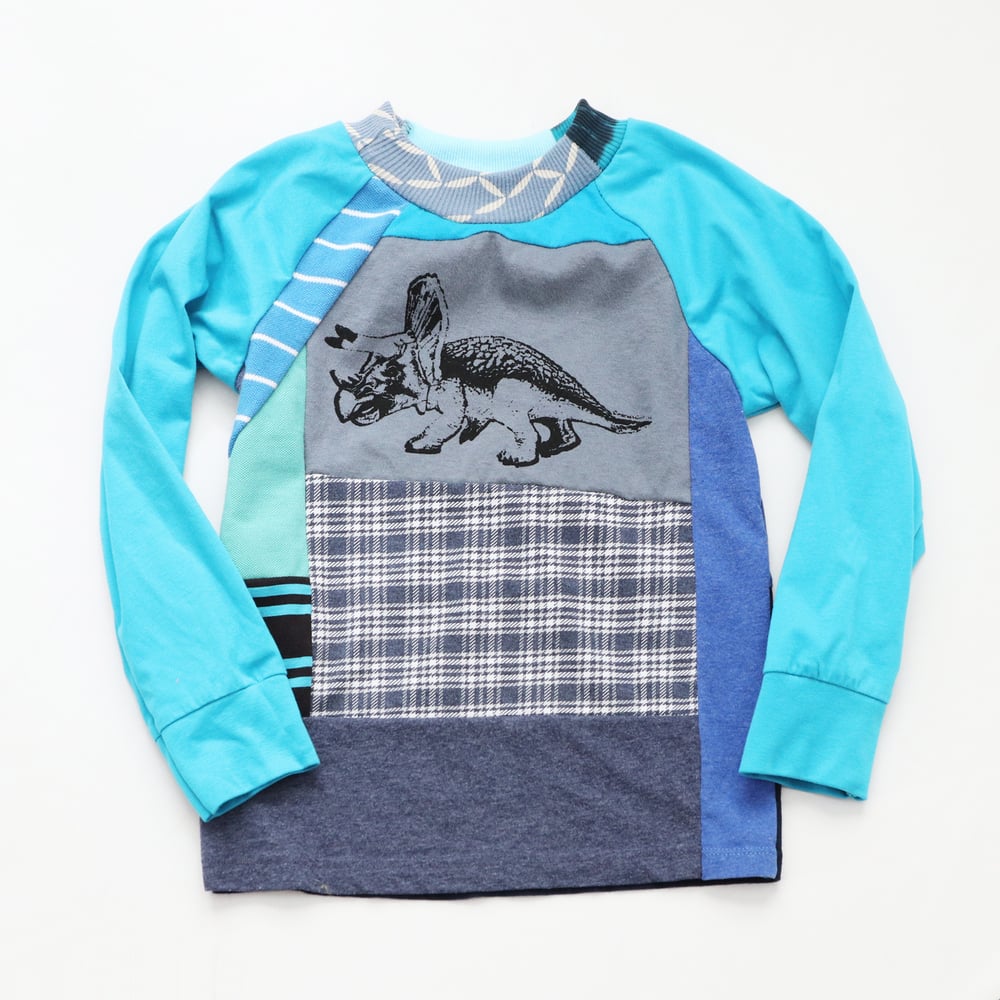Image of triceratops blues baseball raglan longsleeve 6/7 courtneycourtney tee shirt unisex top patchwork