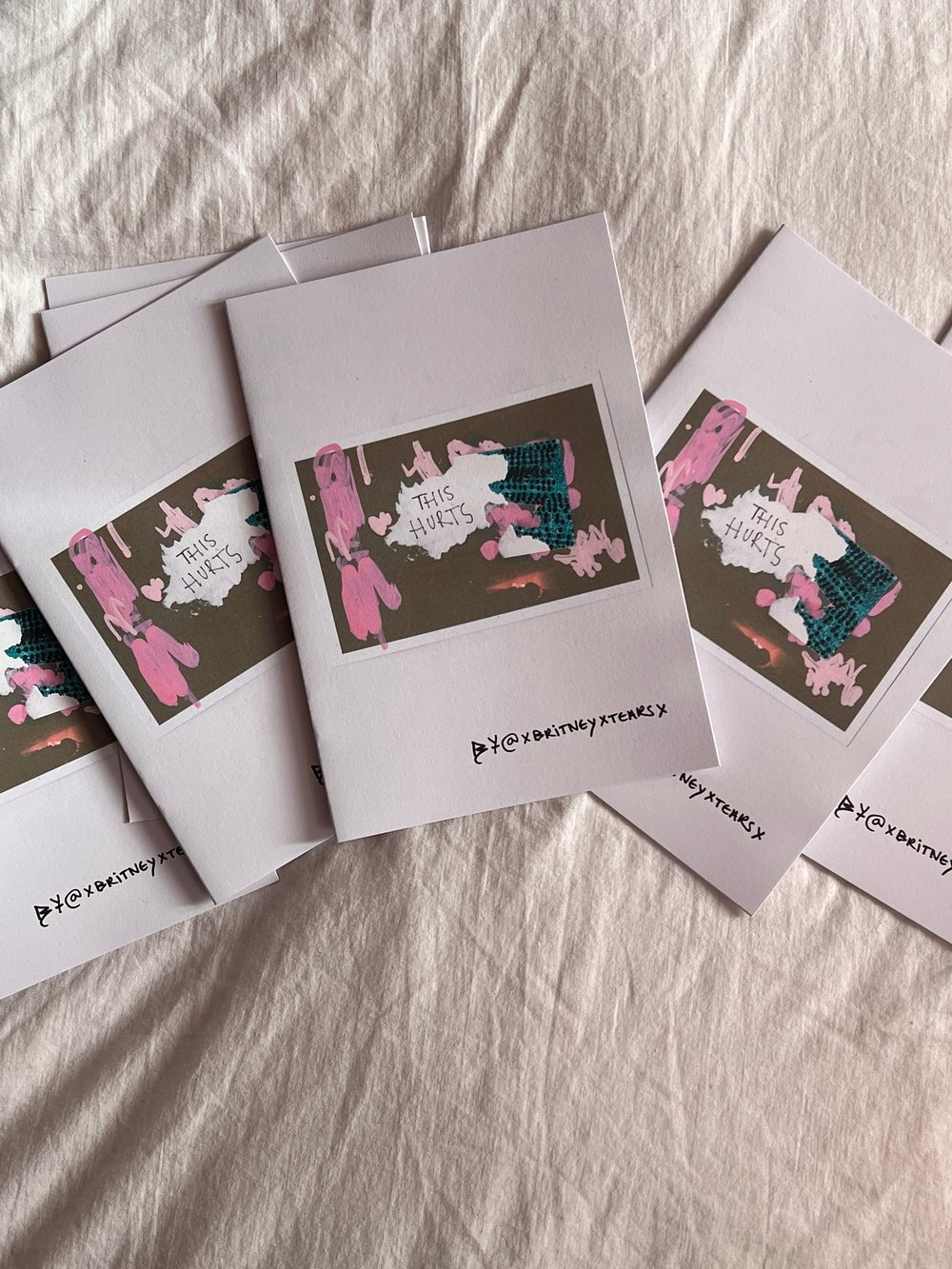 Image of "THIS HURTS" poetry zine x 