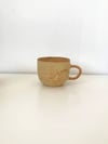 yellow speckled mug