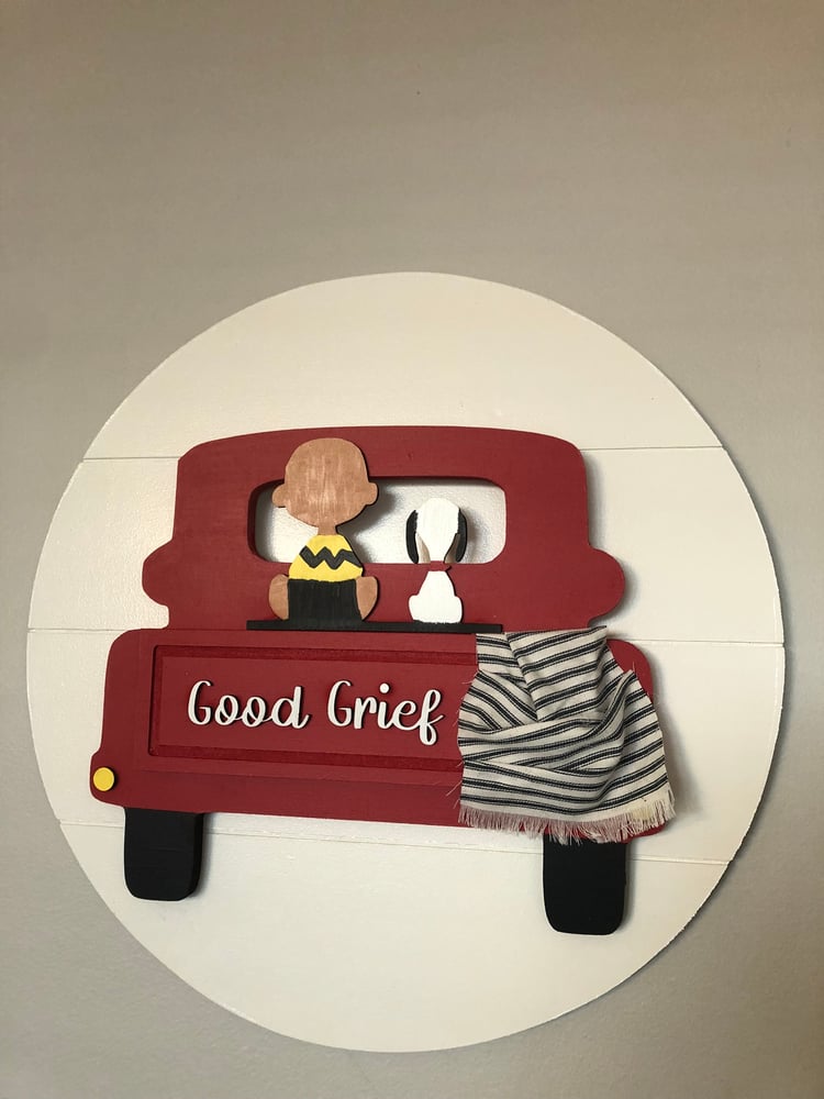 Image of Charlie Brown / Snoopy truck on a 18” shiplap round background 