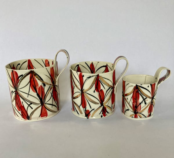 Image of Red and gold Mugs small medium and large