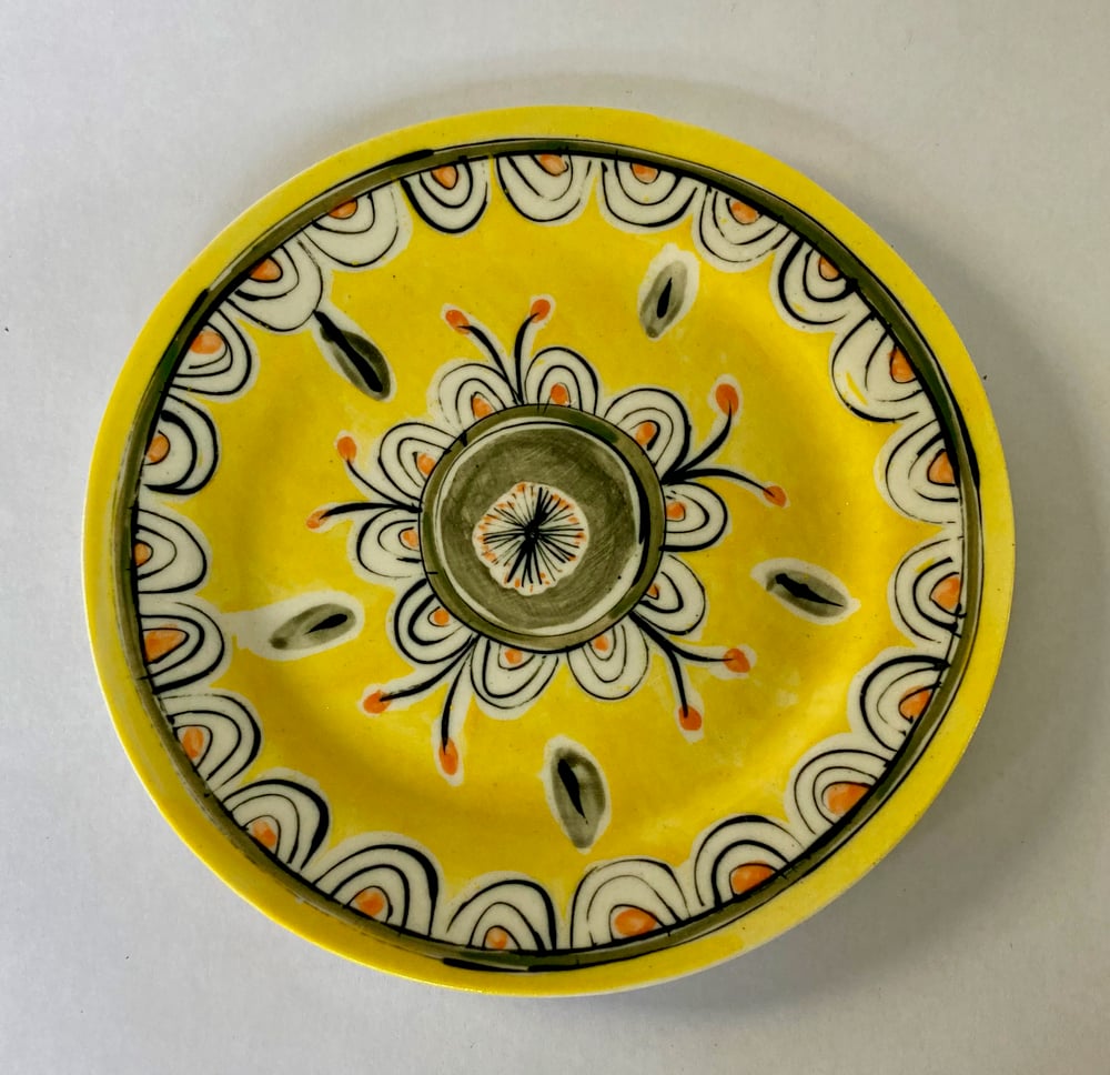 Image of Yellow pattern tea cup jug and plate