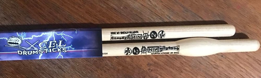Image of UK '22 Tour Signed Souvenir XCEL Drumsticks 