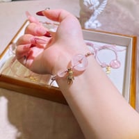 Image 4 of circle Pink quartz bracelet  粉晶平安扣小熊手绳