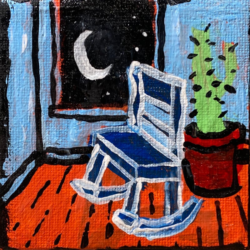 Image of rocking chair and cactus next to window with a waning crescent moon