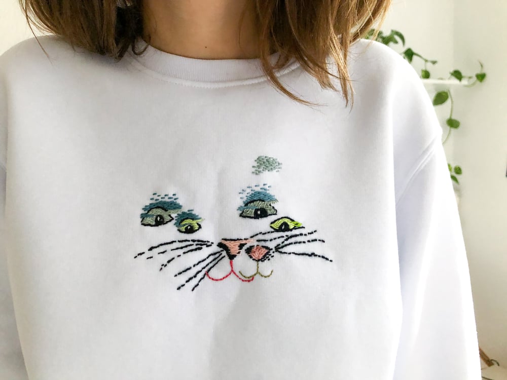 Image of Glitched cat face - hand embroidered sweatshirt, one of a kind.
