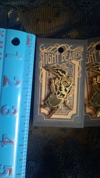 Image 4 of Light Bearer Beetle Enamel Pin