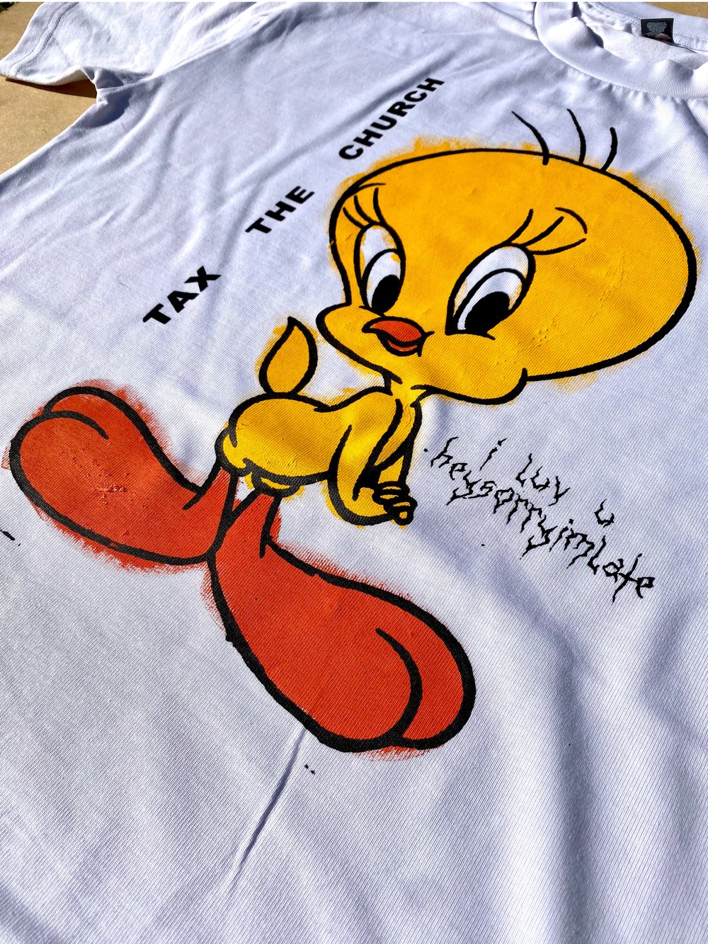 Image of TWEETY SAYS TAX THE CHURCH