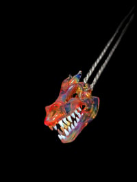 Image 1 of Mini orange elvis dragon skull