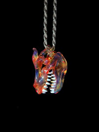 Image 3 of Mini orange elvis dragon skull