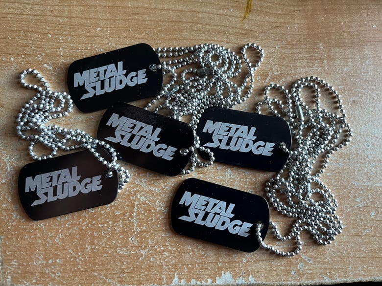 Image of Metal Sludge Dog Tag and Chain... ordering this includes some Pins & Gtr Picks