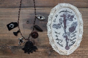 Image of Collana "Erbario in nero"