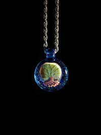 Image 1 of Realism tree pendant backed with crushed opal. 