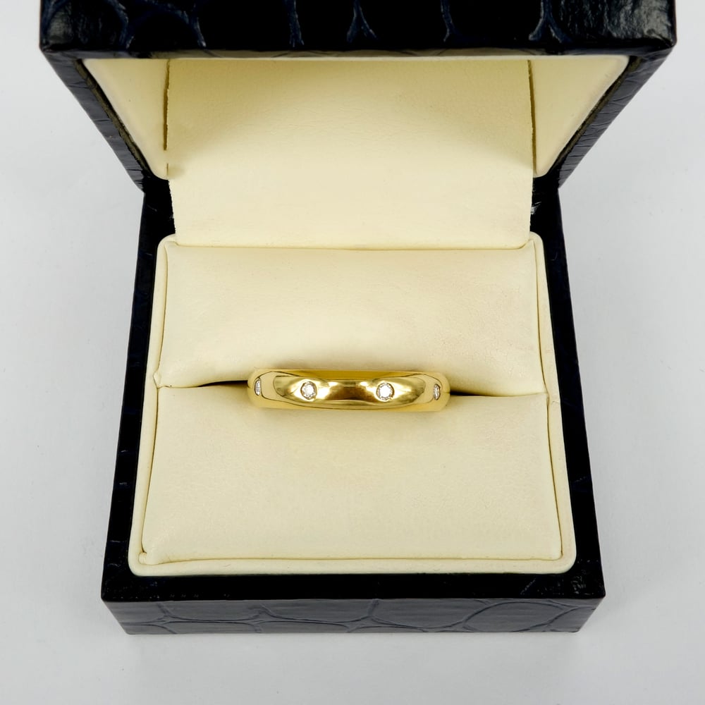 Image of 18ct yellow gold diamond gypsy set wedding ring. PJ0192