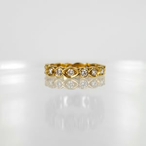 Image of 18ct yellow gold full circle diamond set celebration ring. PJ5395