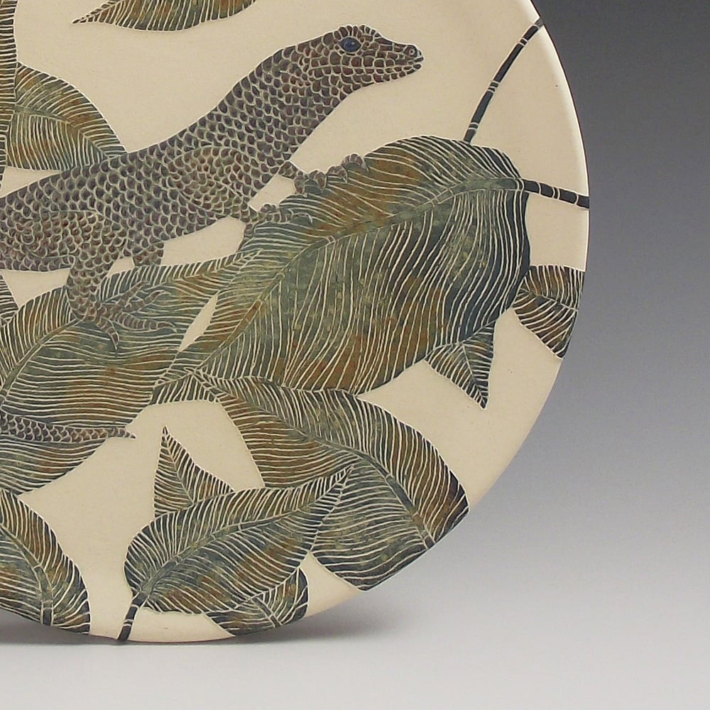 Image of Emerald skink & tropical leaves ceramic sgraffito wall art 
