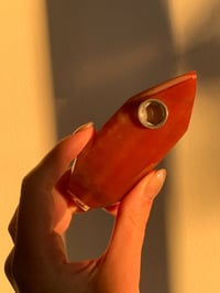 Image 1 of red quartzite pipe