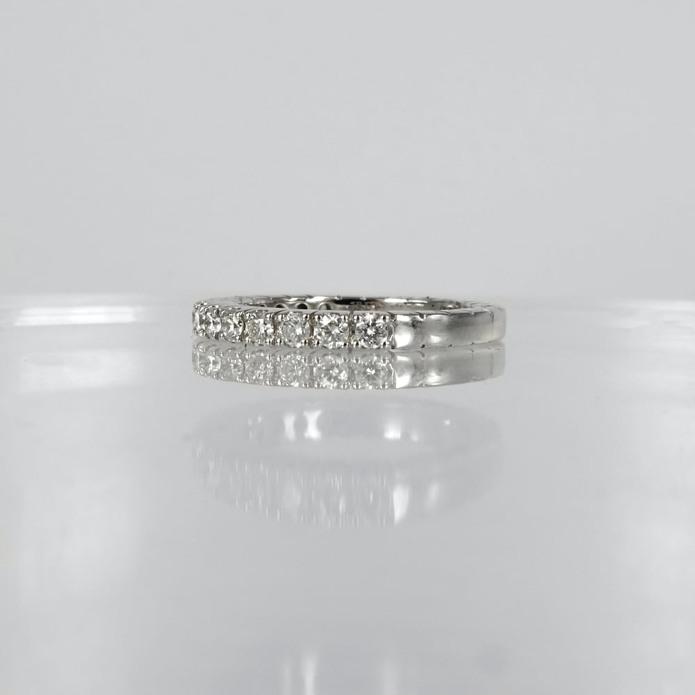 Image of 18ct white gold diamond half set eternity ring. PJ5501