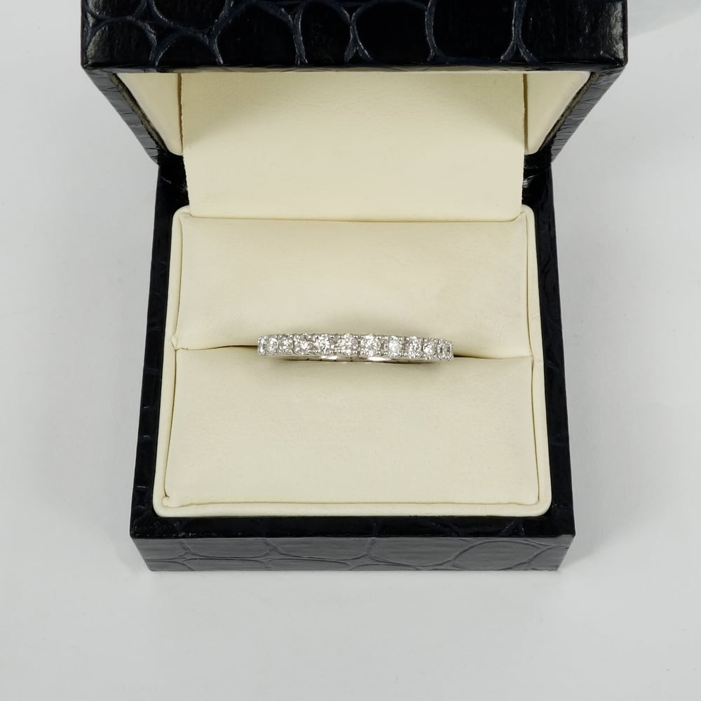 Image of 18ct white gold diamond half set eternity ring. PJ5501