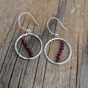 Image of Glamorous gemstone and silver earrings 