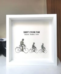 Image 1 of Dad & children on bikes 